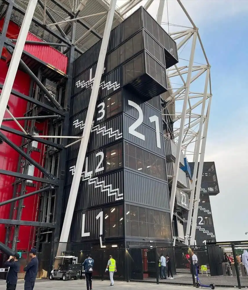 Construction of the Stadium using shipping containers of varying sizes